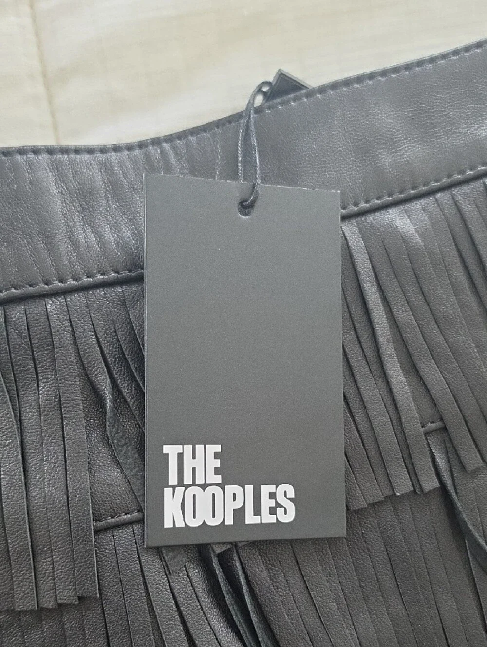 THE KOOPLES - Leather Fringe Mini Skirt in Black - NWT Size 3/L